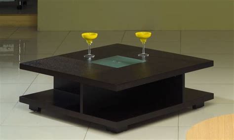 The significance of wood as material runs through different artistic periods in italian a peek into tuscan tradition to modern italian designs, each product is a passionate effort by the artisans to create unique functional and decor. Square Black Wood Coffee Table with Glass Center Oceanside ...