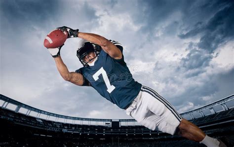 American Football Player Catching A Touchdown Pass Stock Image Image