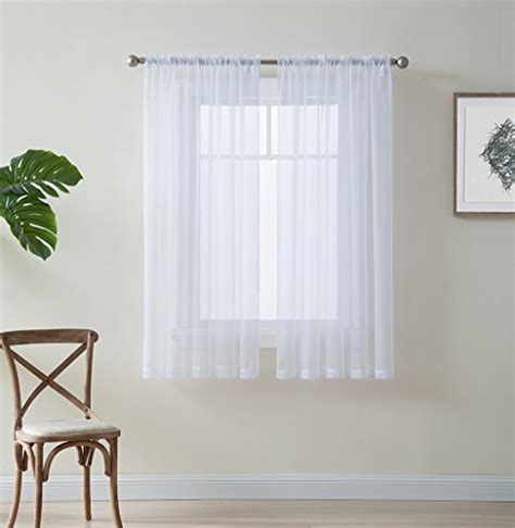 Solid colors like ivory, navy or grey give the space minimalist vibes, while animal or floral prints exude a playful feel. Top 9 63 Inch Sheer Curtains - Window Curtain Panels ...