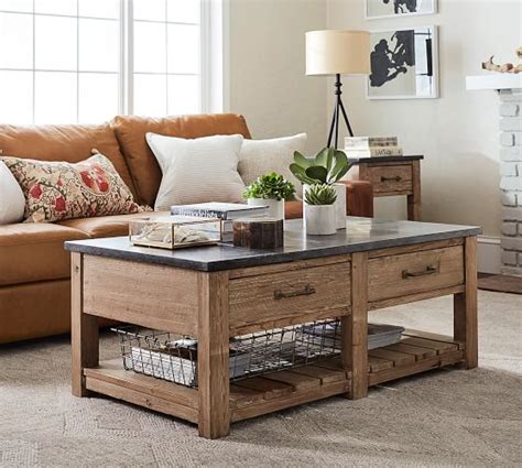 Reinforced seams and substantial ties add durability. Parker Reclaimed Wood Coffee Table | Pottery Barn