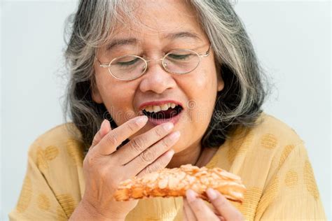 Older Woman Eating Pizza Stock Photos Free Royalty Free Stock Photos From Dreamstime