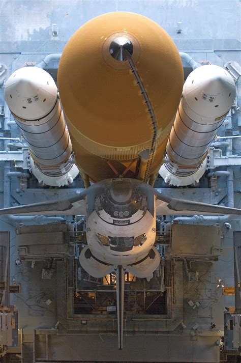 Nasas Space Shuttle Atlantis Sts 117 Rolls Back Into High Bay 1 Of