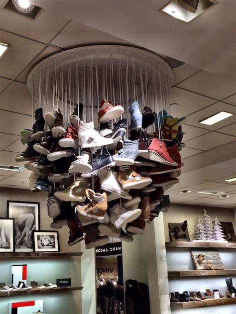This Retail Store Uses A Shoe Chandelier As Its Focal Point Customers