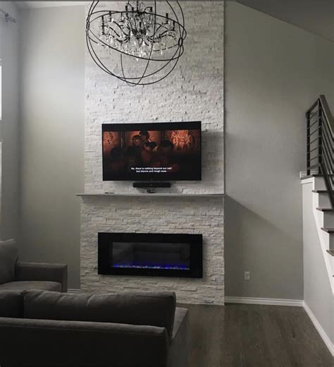 Surrounding a brick fireplace with a wood mantle surround wood mantles that surround brick or tile create classic coziness that can stay looking smart for decades. Stone Fireplace cost (ceiling, tile, Home Depot, gray ...