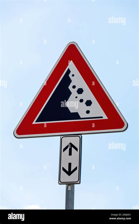 Falling Stones And Rocks Traffic Sign At Pole Stock Photo Alamy