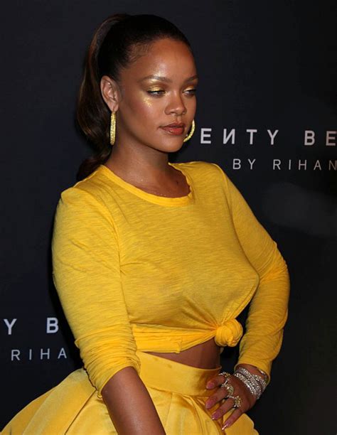 Rihanna Braless Poking Nipples In Sheer Yellow Dress