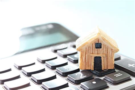 You can always use the cimb housing loan calculator malaysia tool or imoney home loan calculator to estimate the monthly instalment you need to pay. Wood House Model, Coins, Eyeglasses And Saving Account ...