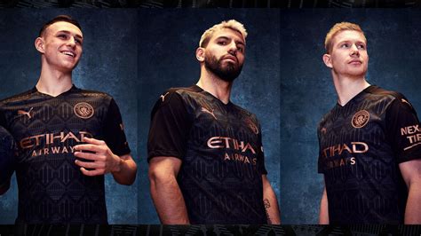 Sergio Aguero And Kevin De Bruyne Pose For Man Citys New Black Away