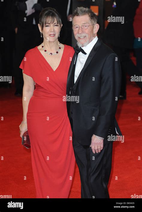 John Hurt And Ann Rees Meyers Arriving At The British Academy Film