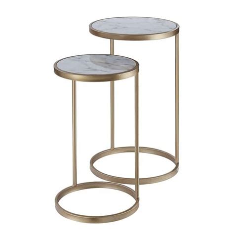 Two Tables With Marble Top And Metal Bases One On Each Side Is Gold Plated