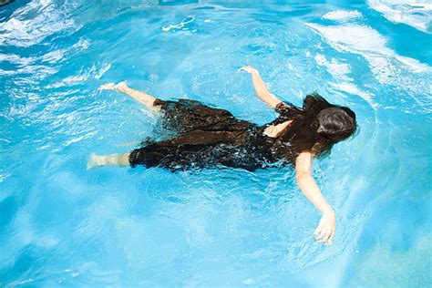 Dead Body Drowning Women Floating On Water Pictures Images And Stock