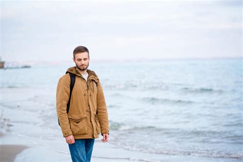 Man Standing At The Beach Stock Photo Image Of Serious 64037668