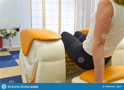 Woman Making Massage For Leg Femur Roll Massage Machine Is A Way To Shape The Figure Stock
