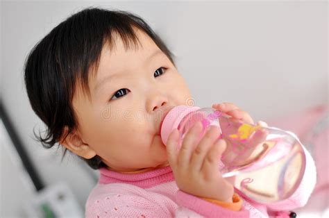 A Asian Baby Girl Drinking Water Stock Photo Image 17556500