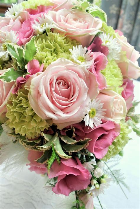 Wedding bouquet with king proteas for spring summer. Pink and green wedding flowers | Shrigley Hall | Cheshire ...