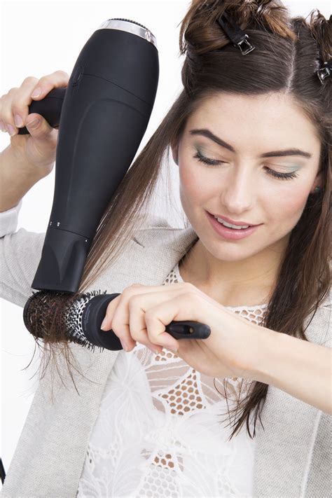 Blow Out Hair How To Model Blow Drying Hair Straight With Round Brush