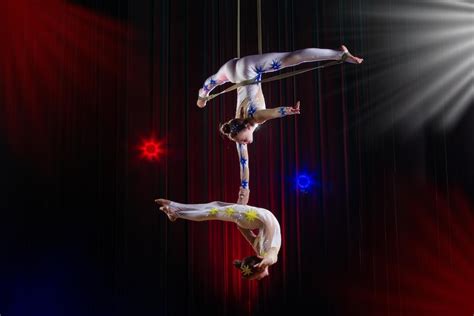 Premium Photo Circus Actress Acrobat Performance Two Girls Perform Acrobatic Elements In The Air