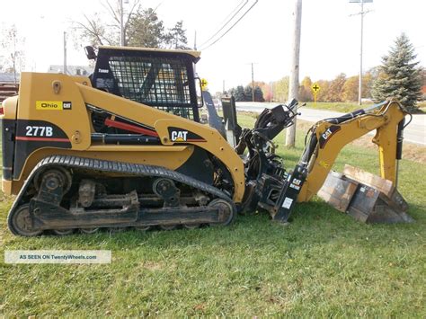 Cat Track Loader Attachments Cat Meme Stock Pictures And Photos