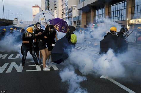 Riot Police Fire Tear Gas At Protesters In Hong Kong On Another Night Of Violence Daily Mail