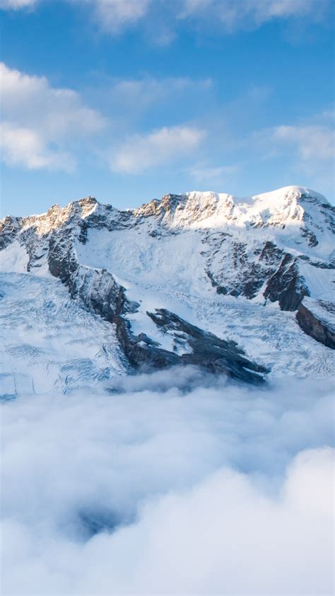 Mountains Summit Snow Clouds Wallpaper 720x1280