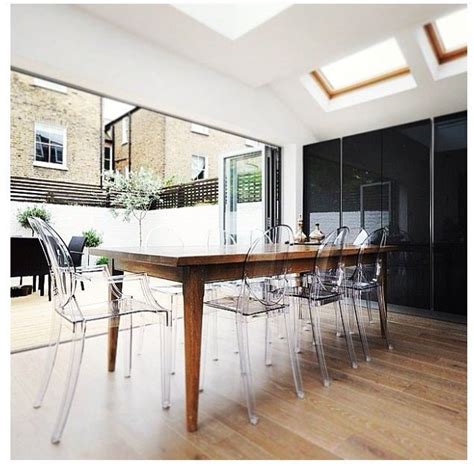 Clear dining chairs have become popular in recent years. clear chairs dining room - Google Search | Dining room ...