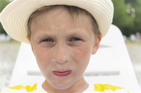 Premium Photo Portrait Of Cute Beautiful Boy In Hat With Freckles