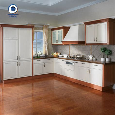 They are more conducive to recycling, and they can use pieces from trees that would be wasted and not usable for wood cabinets. Plastic PVC door laminate kitchen cabinet