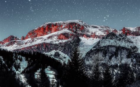 Download Wallpaper 2560x1600 Mountains Starry Sky Peaks Snow Grass