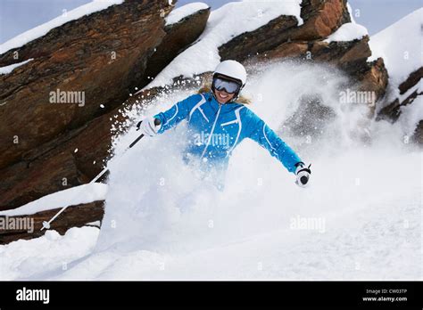 Skier Coasting On Snowy Slope Stock Photo Alamy