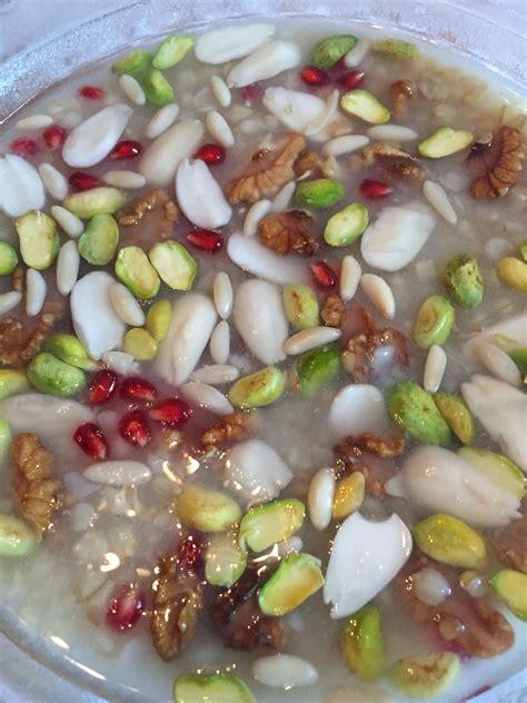 a bowl filled with lots of different types of nuts and other things in