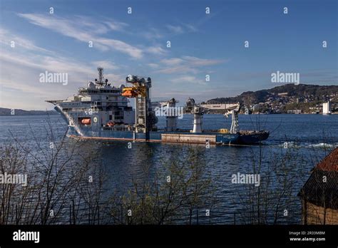 Offshore subsea construction vessel North Sea Giant departing from port