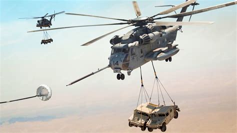 Us Skilled Helicopter Pilots Carry Two Humvees While Refueling Youtube