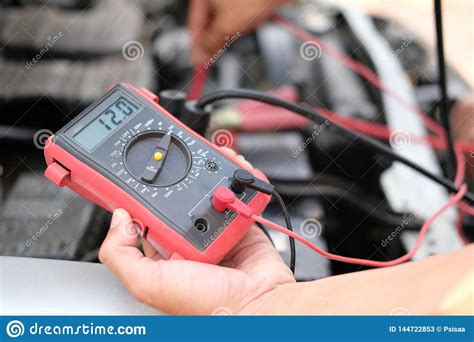 How you can check your car battery terminals by using a multimeter? Auto Mechanic Check Car Battery Voltage By Voltmeter ...