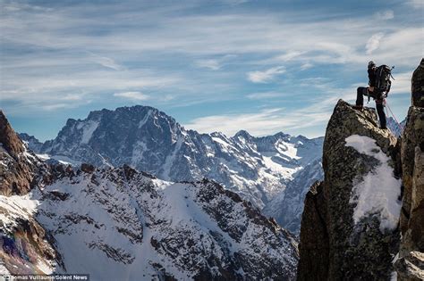 Photographer Thomas Vuillaume Captures Daredevil On Top Of Aiguille