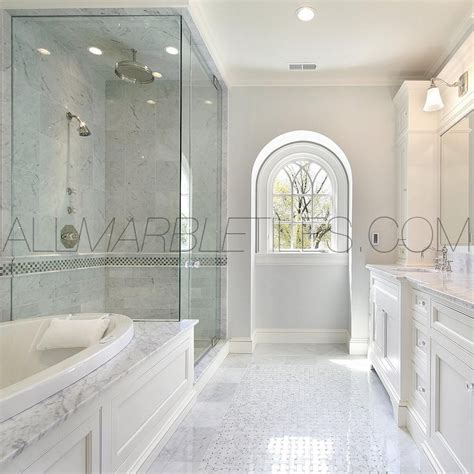 Less stark here because there is more white in the tile. Carrera Marble Bathroom Part 4 - Carrara Marble Tile ...