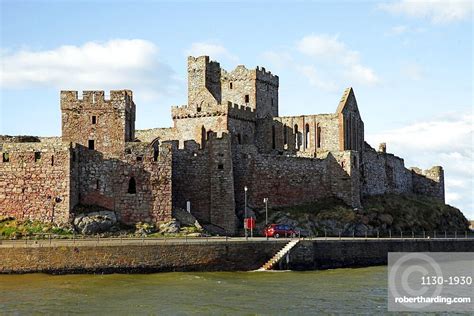 Peel Castle And Harbour Wall Stock Photo