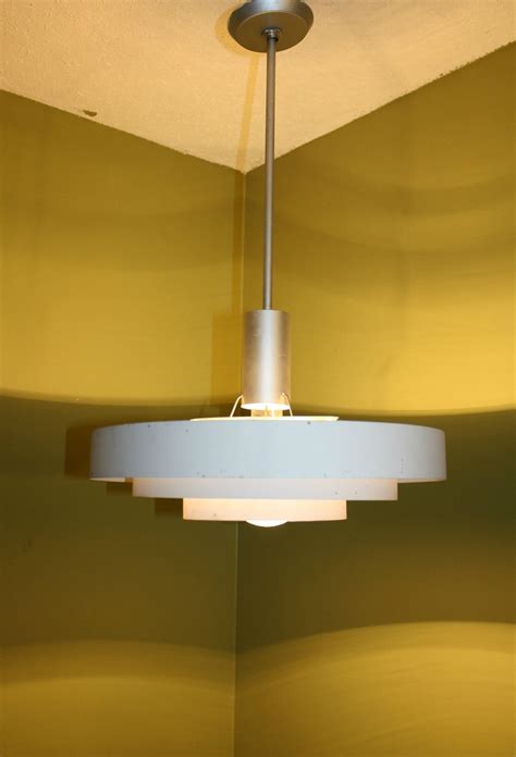 This stunning modern pendant light features a chrome finish bullet ceiling canopy upon which a cluster nineteen glass globes are attached via cables. RESERVED Mid Century Modern Ceiling Light Fixture RESERVED