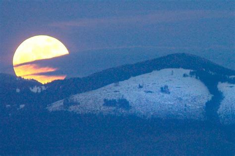 The Moon Rises Over Cultus Mountain In Skagit County Washington State