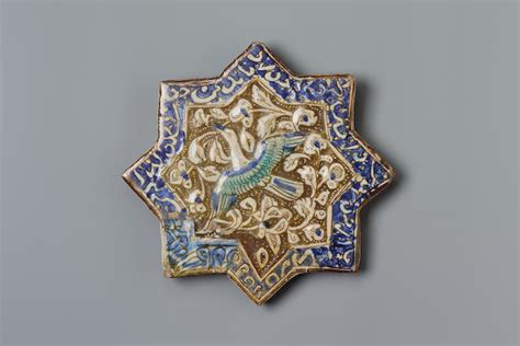 bonhams an ilkhanid moulded pottery star tile persia late 13th century