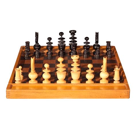 He molded the skull face onto a regular sized checker piece and it's an average size board on an end table. French Chess and Checker Set at 1stdibs