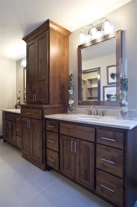 Knotty Alder Vanity With A Large Linen Tower Dual Sinks And White