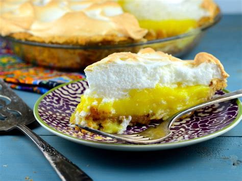 Strain the mixture into a jug and carefully pour into the baked tart cases. Ultimate Lemon Meringue Pie - Foodgasm Recipes