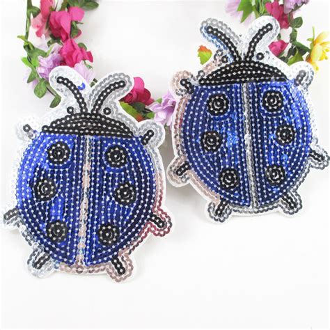 Take it out of the machine, and carefully remove the tear away stabilizer. ladybirds sequins embroidery patch diy clothing patch ...