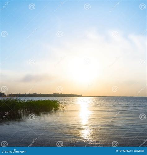 Dramatic Sunset Over Quiet Lake Stock Image Image Of Panoramic