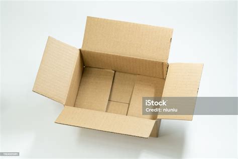 Isolated Shot Of Opened Blank Cardboard Box On White Background Stock