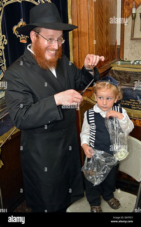 A 3 Year Old Religious Jewish Boy Getting His First Haircut A Lock