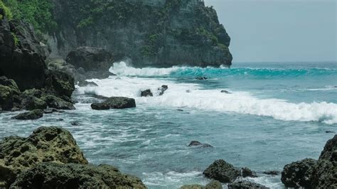 Ocean Waves Hitting Tembeling Coastline At Nusa Penida Island Bali