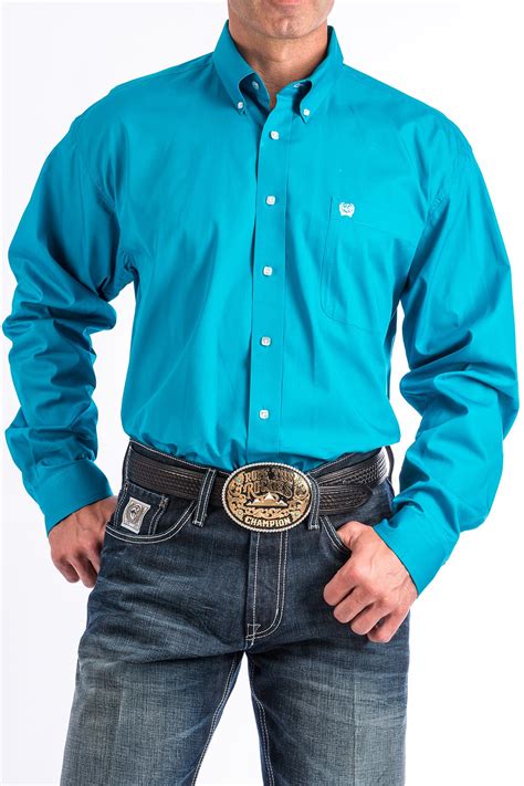 A modern shirt style designed to transition seamlessly from the formal to the casual. CINCH Jeans | Men's Solid Turquoise Button-Down Western Shirt