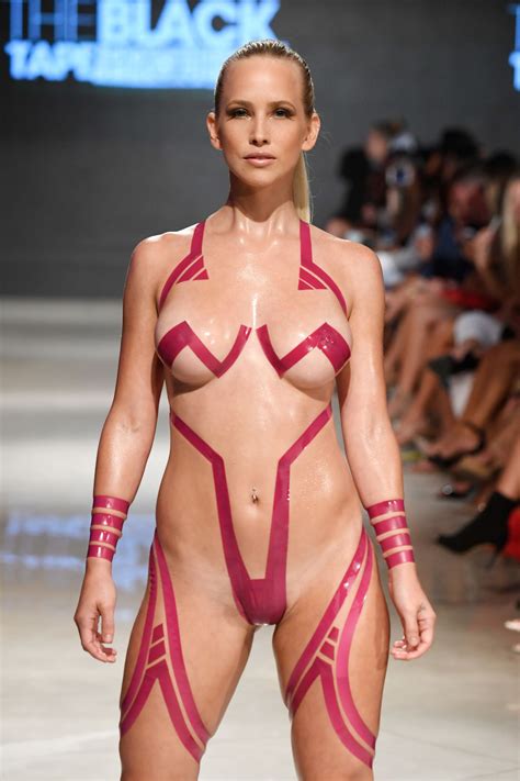 Models Don Eye Popping Looks In Tape Only Swimsuit Show