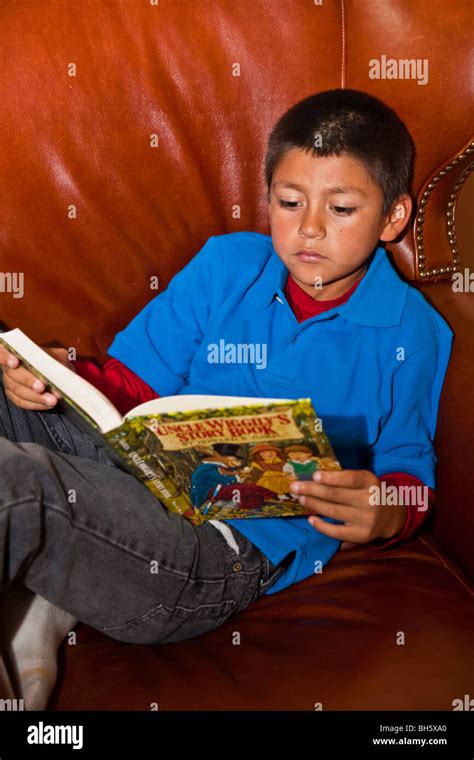 Diverse Children Relax 8 9 Year Old Reading Book On Sofa Vintage Books